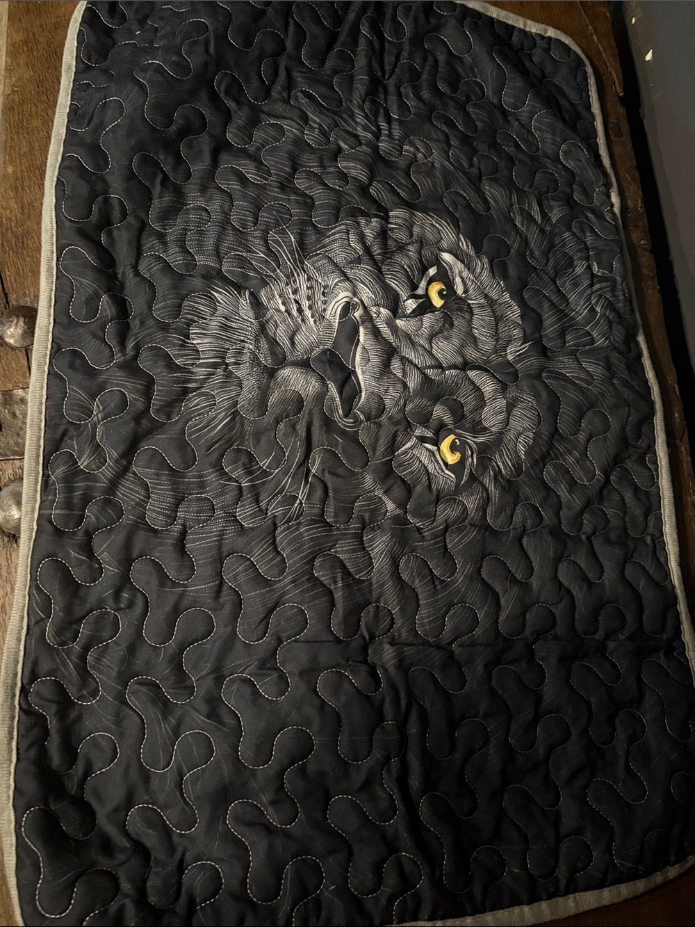 Black Quilted twin blanket with Embroidered Lion Face